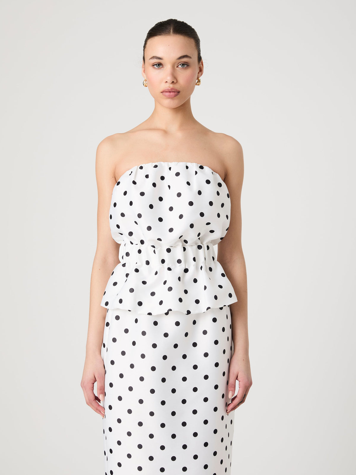 ‌Polka Dot Peplum Top