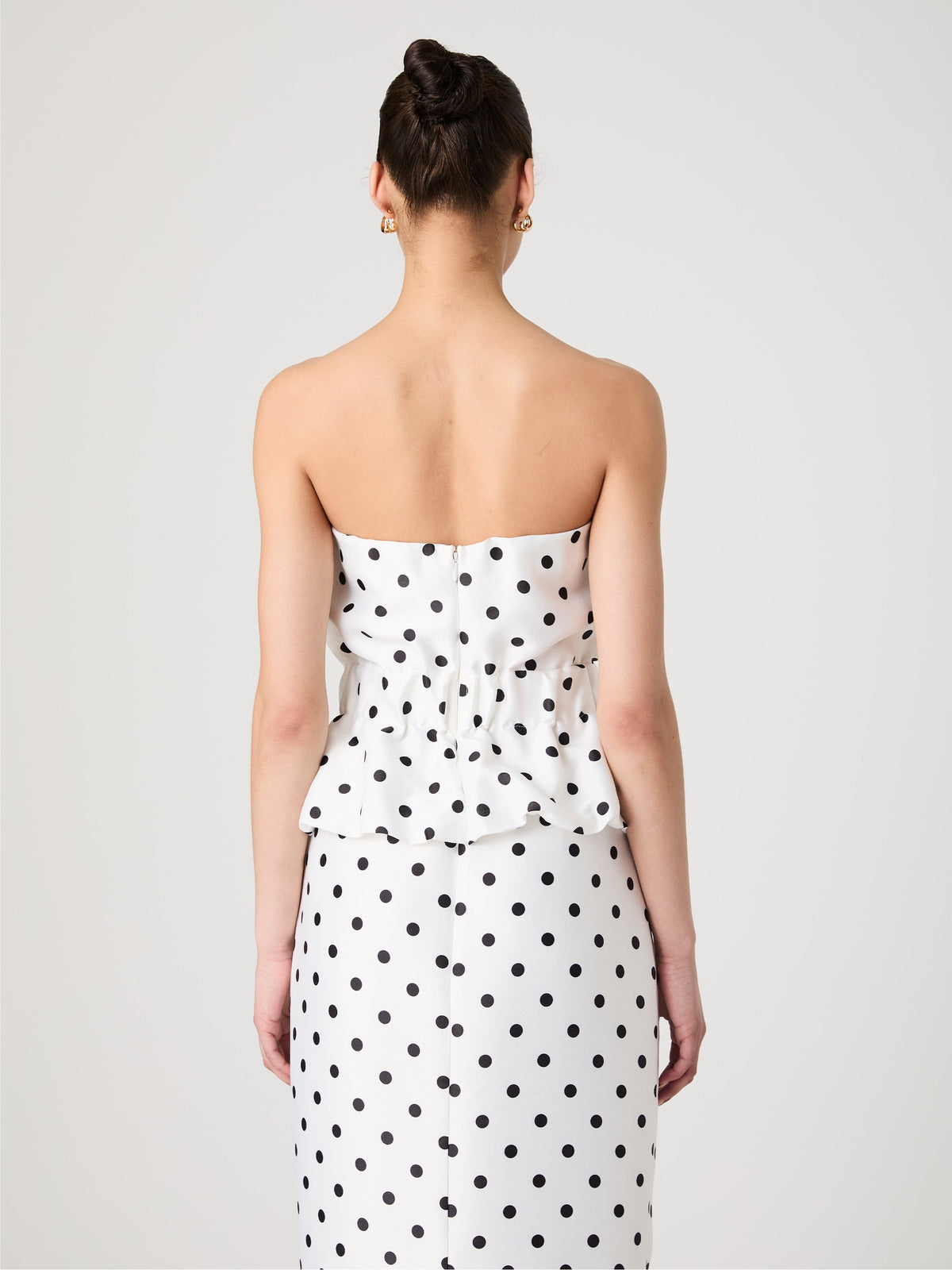 ‌Polka Dot Peplum Top