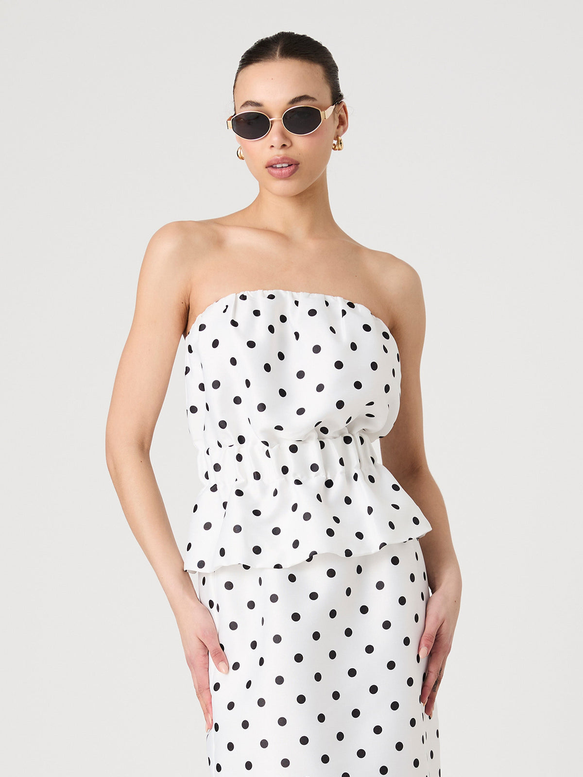 ‌Polka Dot Peplum Top